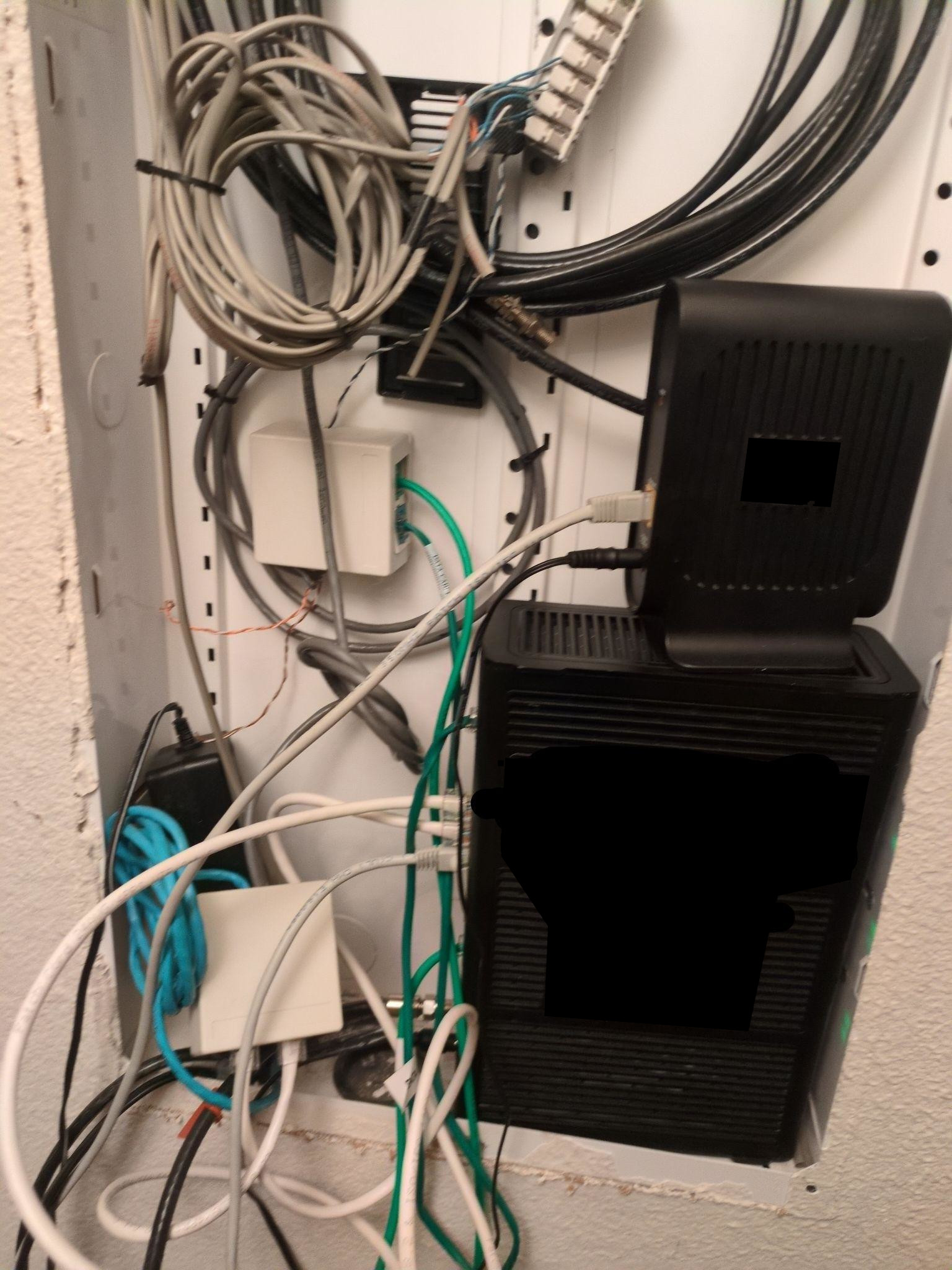Mode/router shoved in a shoe closet